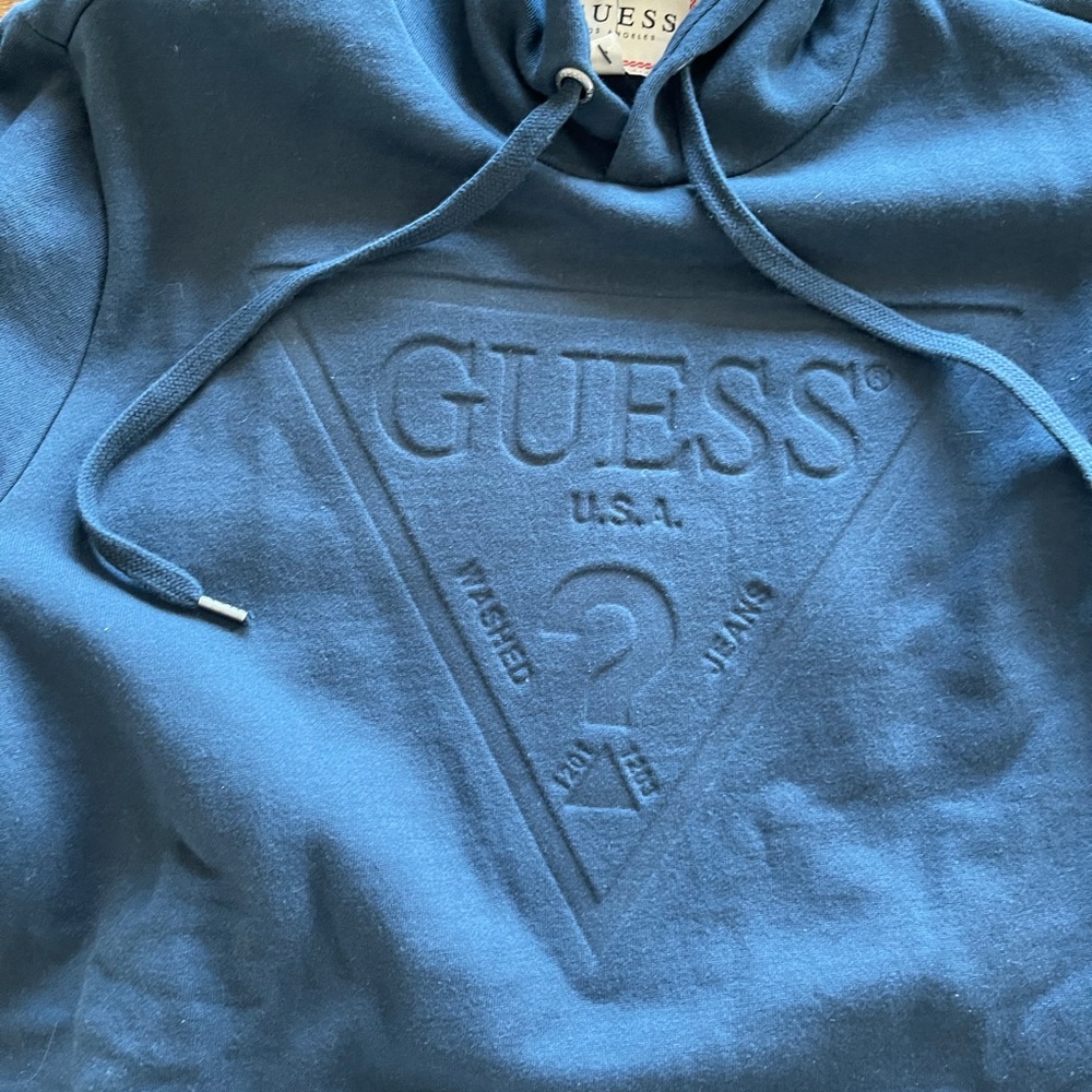 Brand new Guess hoodie, size is too small.